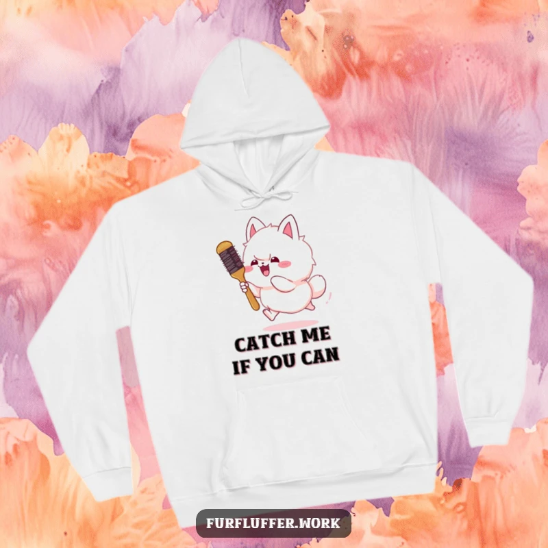 Funny hoodie showing a fluffy animal gleefully chasing a bouncing grooming brush, capturing a moment of pet silliness and fun.